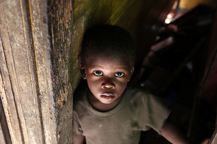 a poor young boy in jamaica 